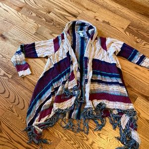 Maurice’s open cardigan